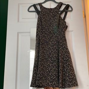 Unique jacquard dress with faux leather straps